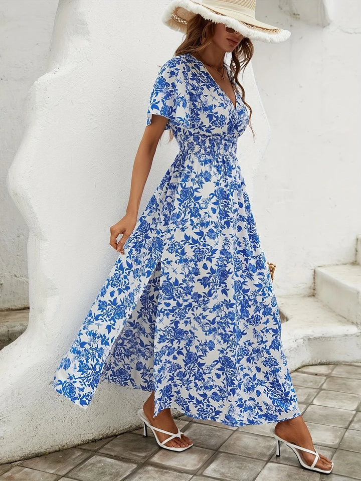 Elin® Sommarklänning – Blå Blommor & Elegant Siluett